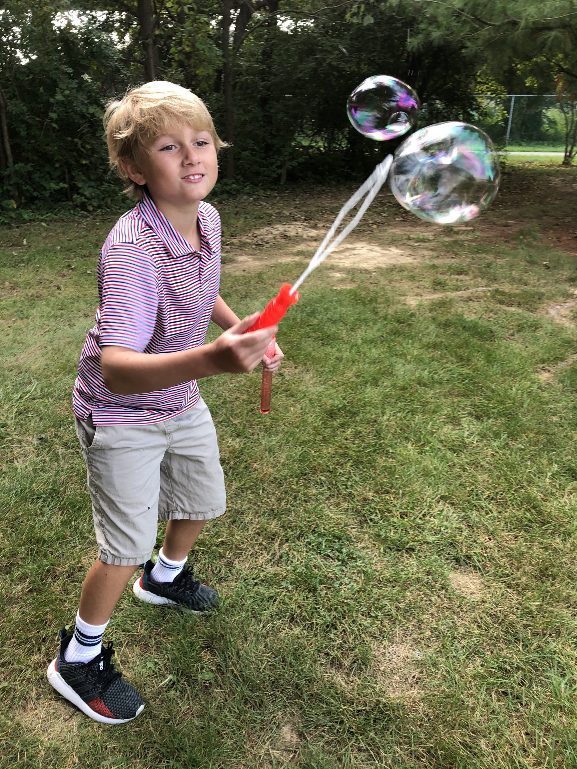 Student plays with bubbles